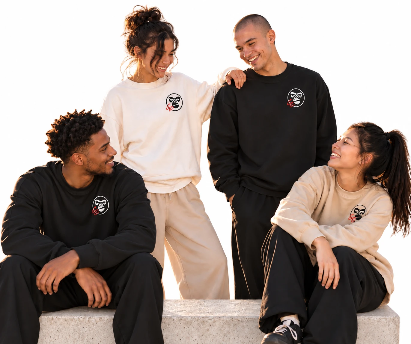 Illustrative GC campaign: four adult friends wearing black, cream and sand gorilla-mark sweatshirts